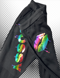 a pair of black sweatpants with rainbow lips on them