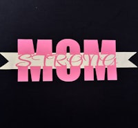 a pink banner with the word mom on it