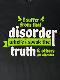 a black t - shirt that says'disorder speak the truth'
