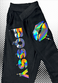 a pair of black sweatpants with the word bossy on them