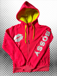 a pink and yellow hoodie with the word kiss on it